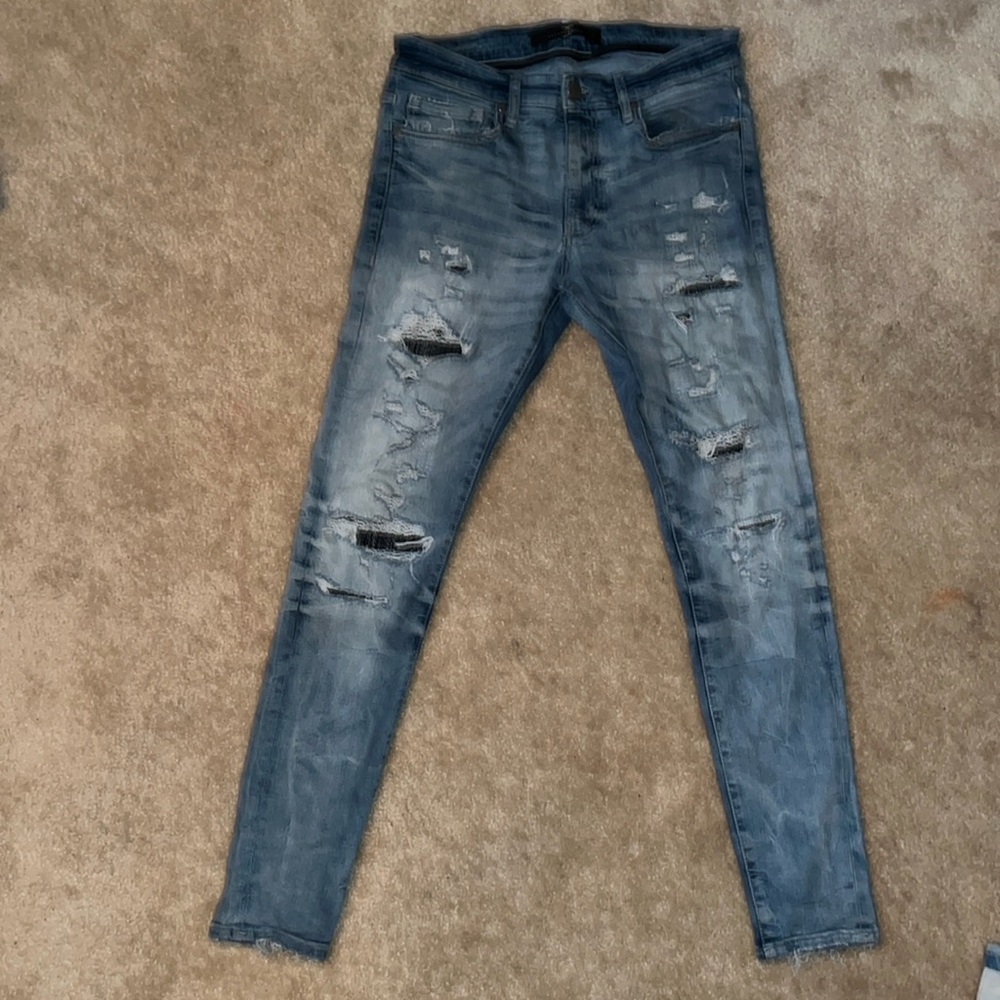 Blue Skinny Distressed Jeans with Tapered Ankles